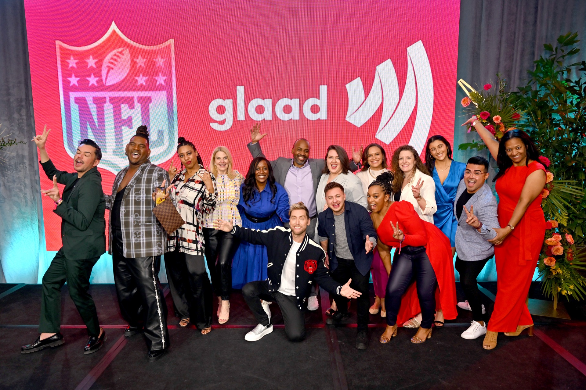 MMG clients and partners on stage at a GLAAD event